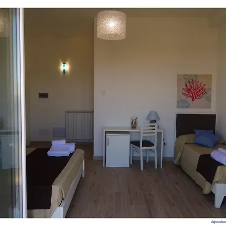 Faro Bianco - Suites&apartments Affittacamere